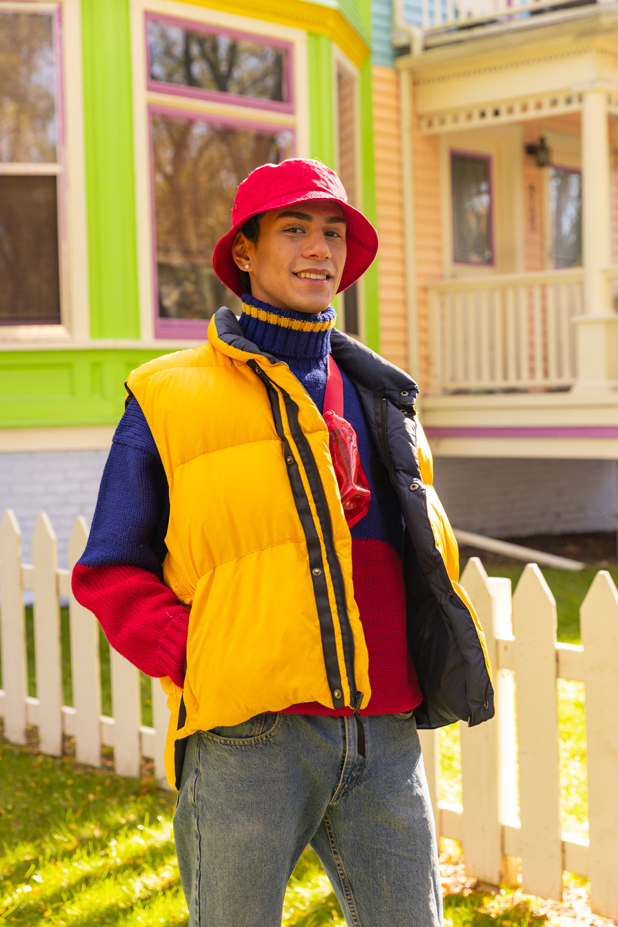Young Man in Trendy Colorful Outfit Outdoors